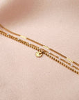 Victoire Collection - Wholesale Charm/Dangle Bracelet - Triple stainless steel bracelet with white dots1
