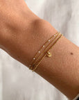 Victoire Collection - Wholesale Charm/Dangle Bracelet - Triple stainless steel bracelet with white dots0