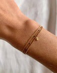 Victoire Collection - Wholesale Charm/Dangle Bracelet - Triple stainless steel bracelet with white dots2